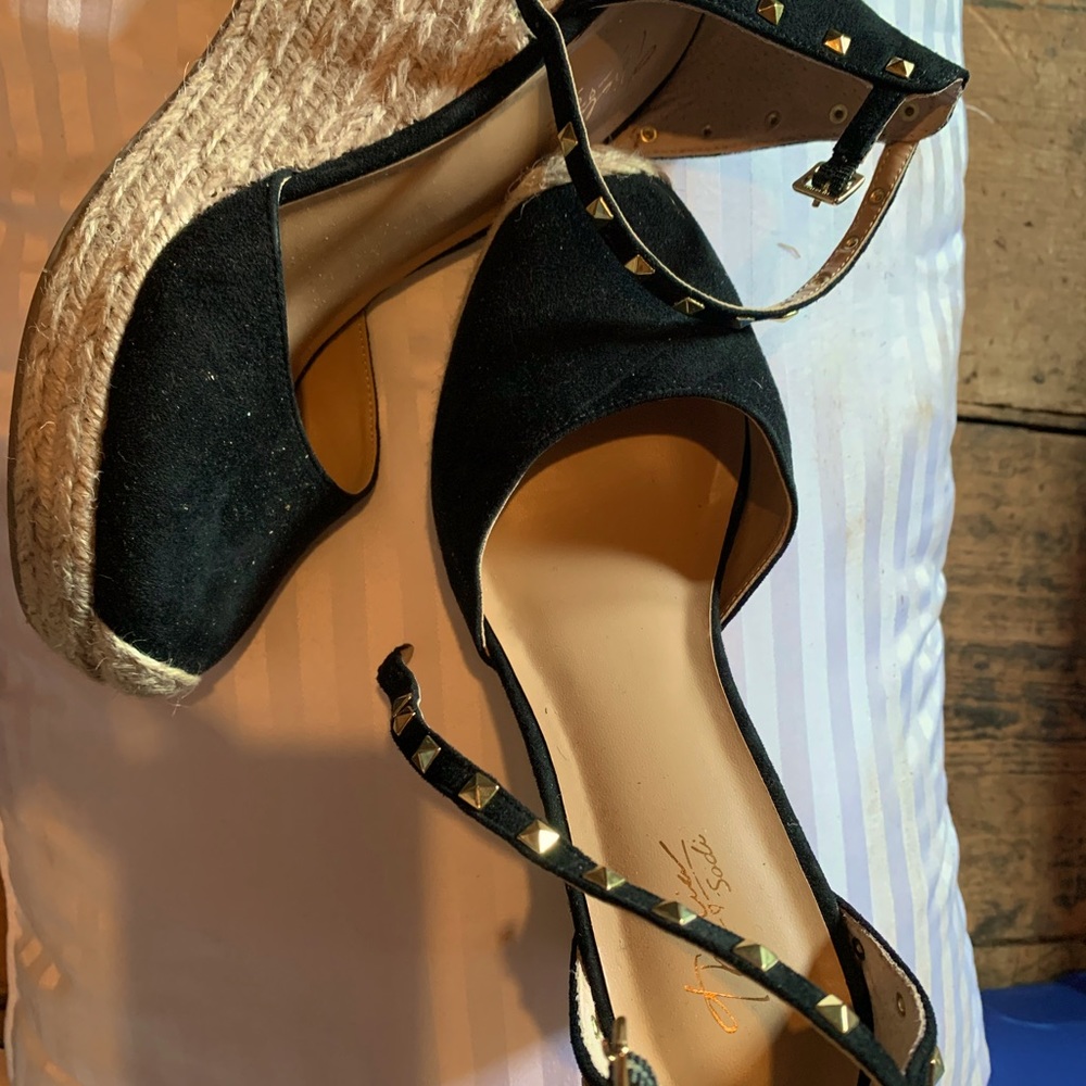 Wedge heels with straps.